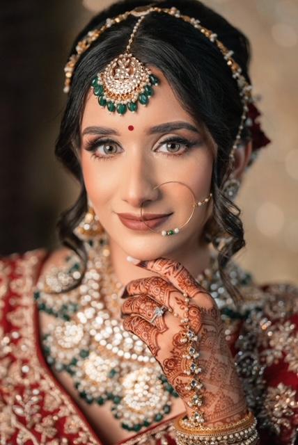 Bride wearing kundan jewelry set from Outbox House